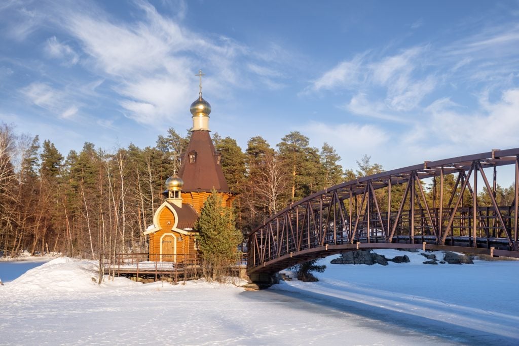 small wooden church surrounded by snow in winter apostle islands wisconsin