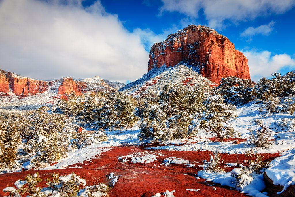 red rock landscape of sedona arizona after a snowfall during winter in usa getaway