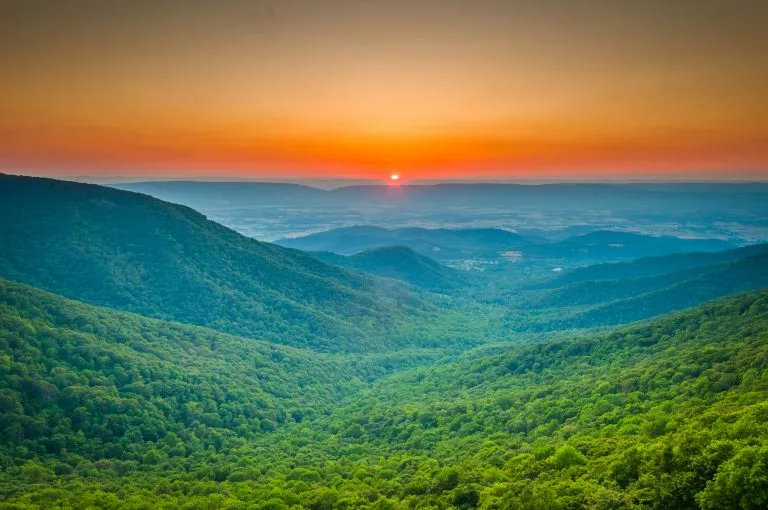 sunset over shenandoah national park, one of the best places to visit in virginia vacation spots