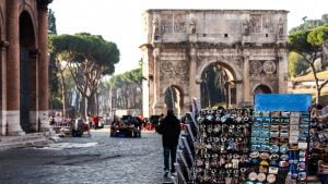 arch of constantine with rome souvenirs stand in the foregorund