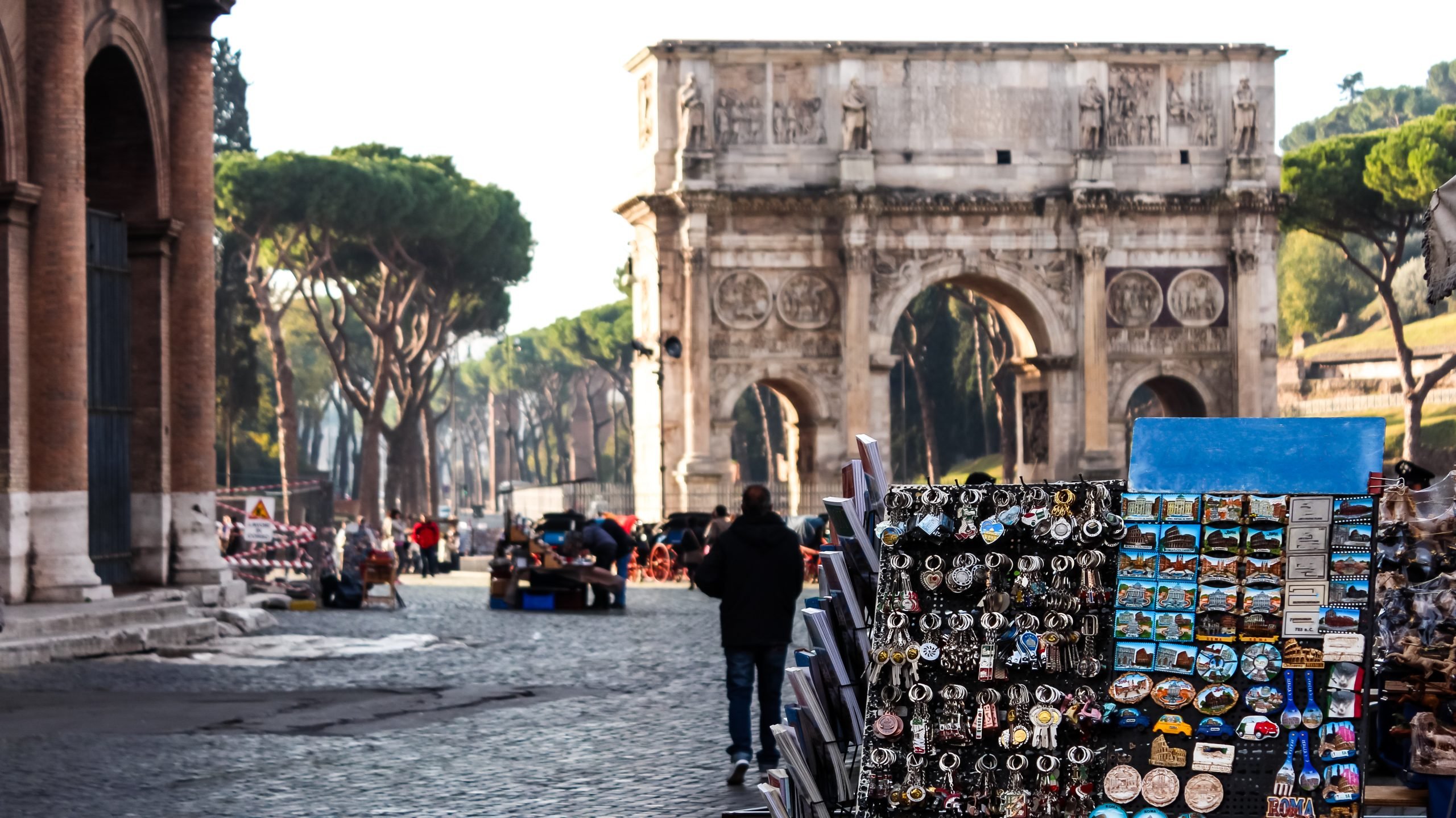 arch of constantine with rome souvenirs stand in the foregorund