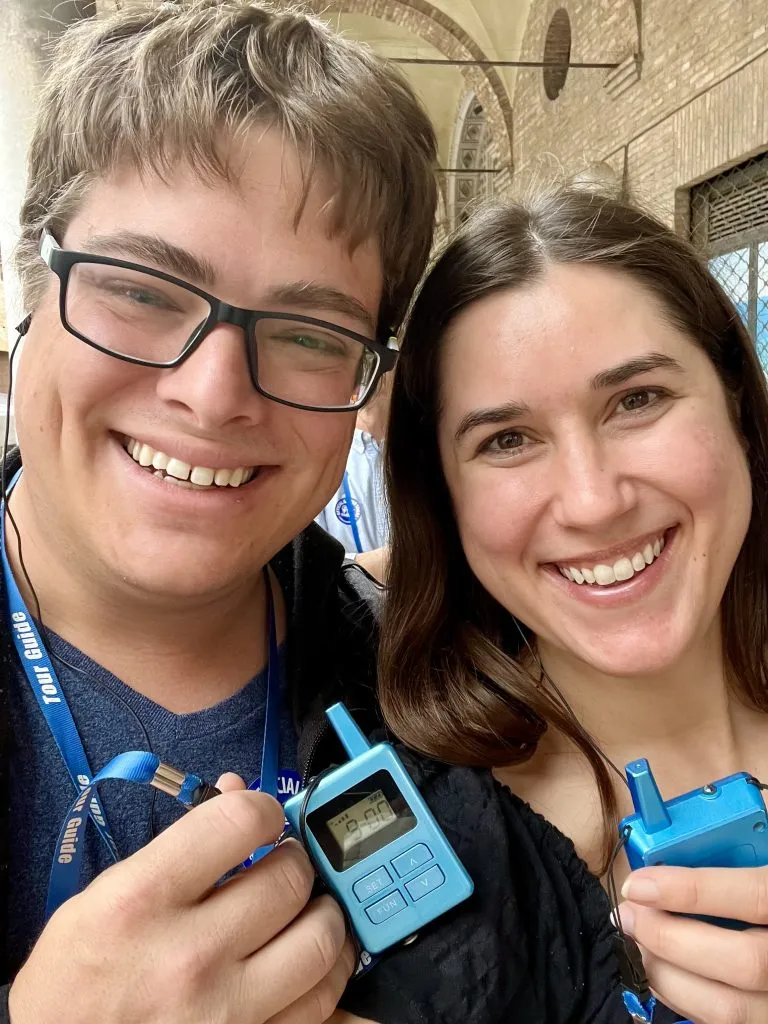 selfie of kate storm and jeremy storm with headphones to hear the guide for a mosaics tour ravenna italy