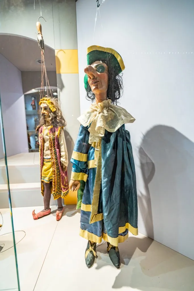 puppets on display at the castle puppets museum, one of the best hidden gems in parma italy