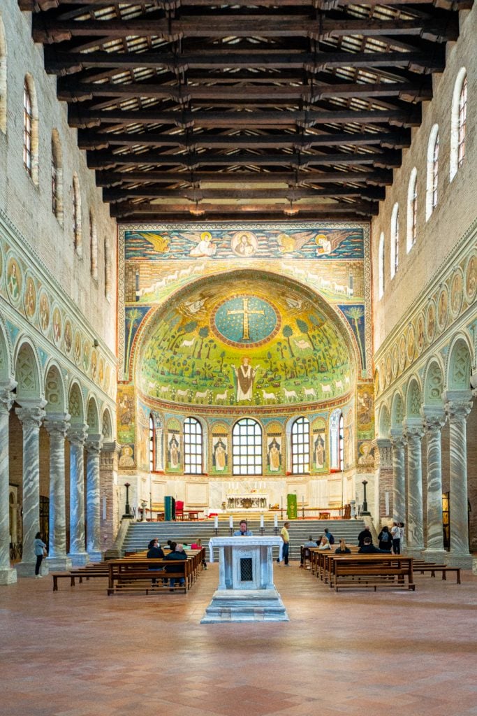 interior of Basilica of Sant'Apollinare in Classe with mosaic dominating the center