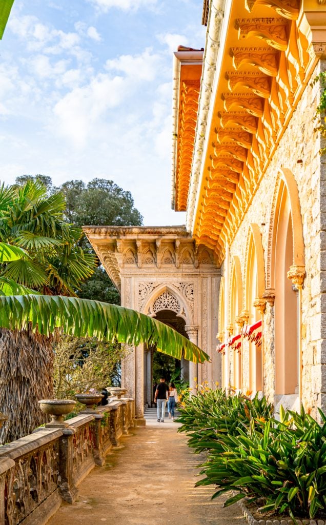 pathway along the edge of monserrate palace on a day trip from lisbon to sintra portugal