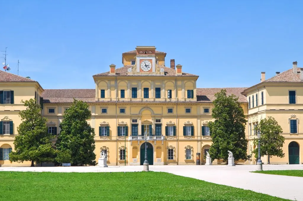 front facade of the ducal palace on a sunny day during parma travel