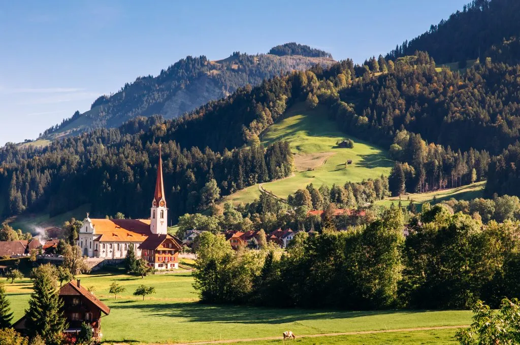 church with steeple in the alps of entlebuch switzerland