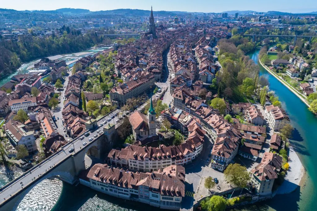 aerial view of bern surrounded by aare river, one of the most interesting switzerland cities to visit