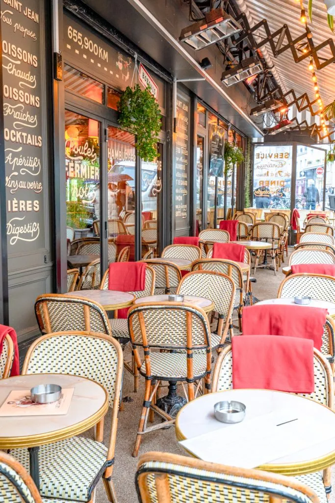 cafe in paris france getting ready to open for the day