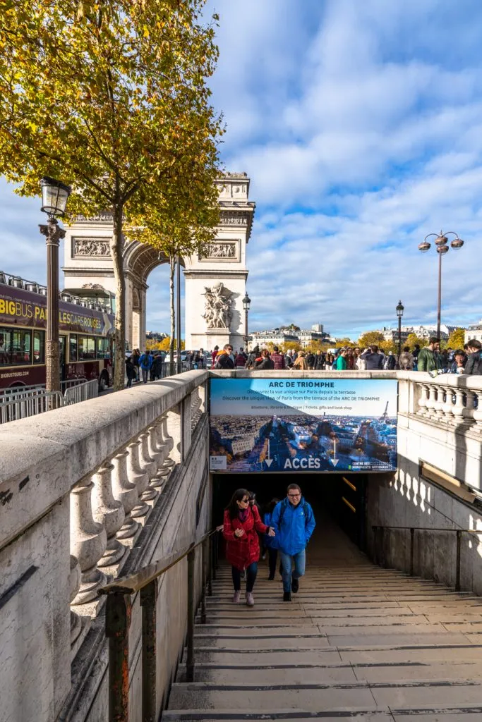staircase to the underground passage to access underneath the arc de triomphe with arch visible in the background