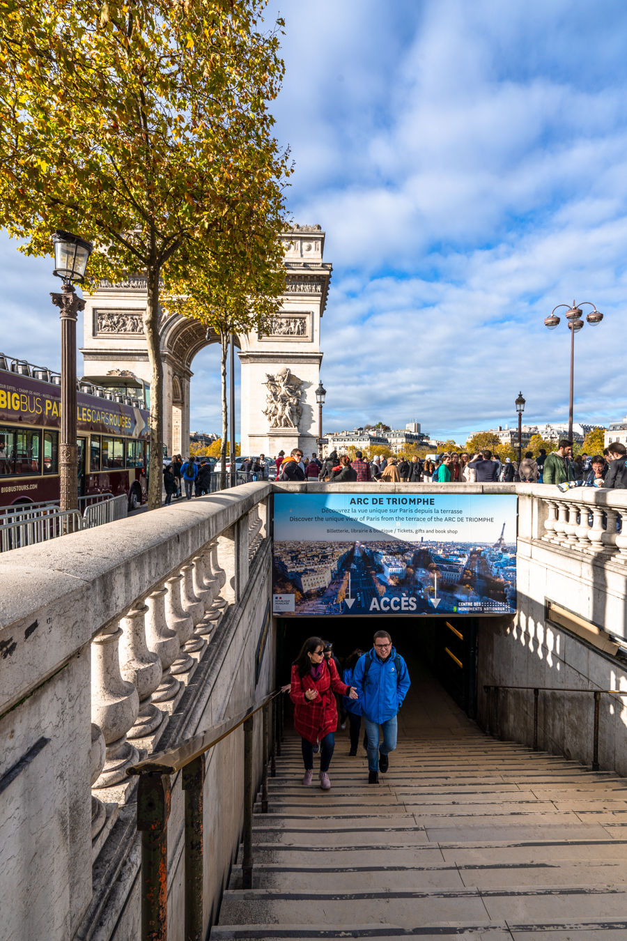 staircase to the underground passage to access underneath the arc de triomphe with arch visible in the background