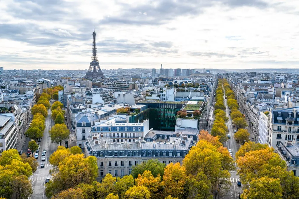 view of eiffel tower and surrounding avenues as seen after go up arc de triomphe paris
