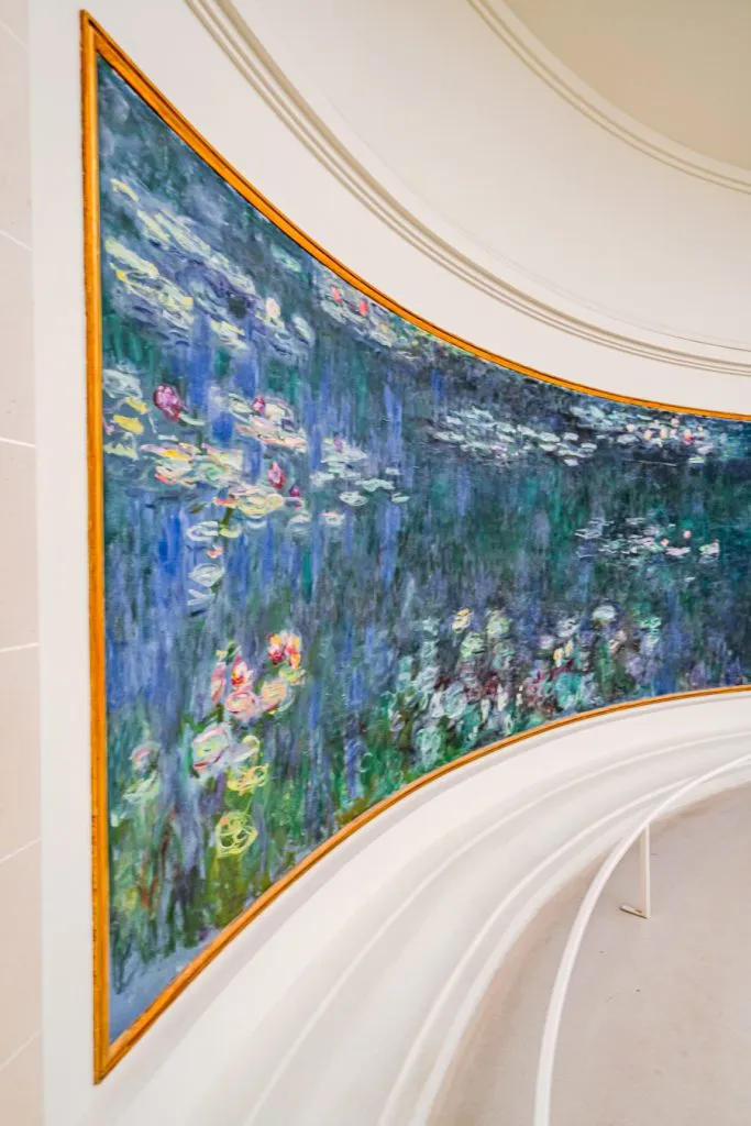 view of one corner of monet water lilies in musee d orangerie during a day in paris itinerary