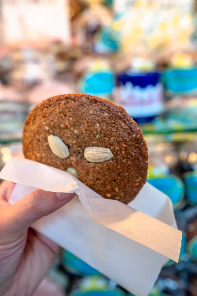 nuremberg lebkuchen being held out, one of the best things to eat at christmas markets in germany
