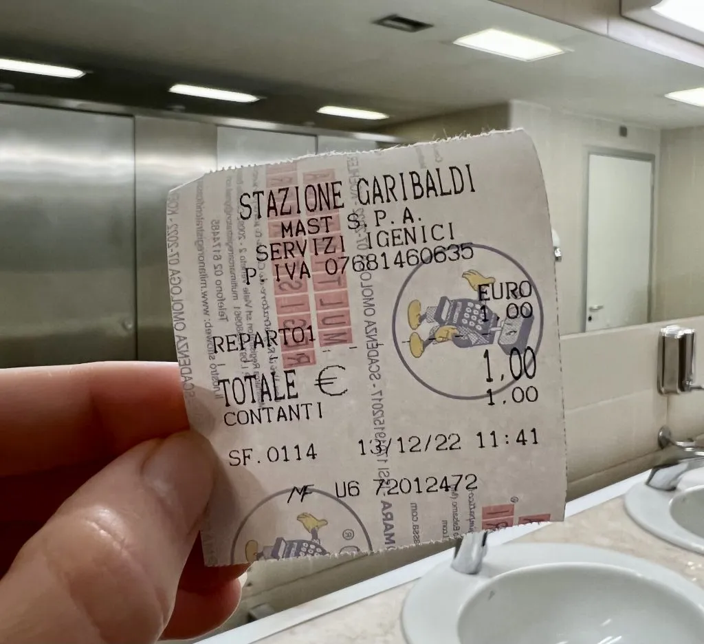 receipt for access to european toilets in italy at a milan train station