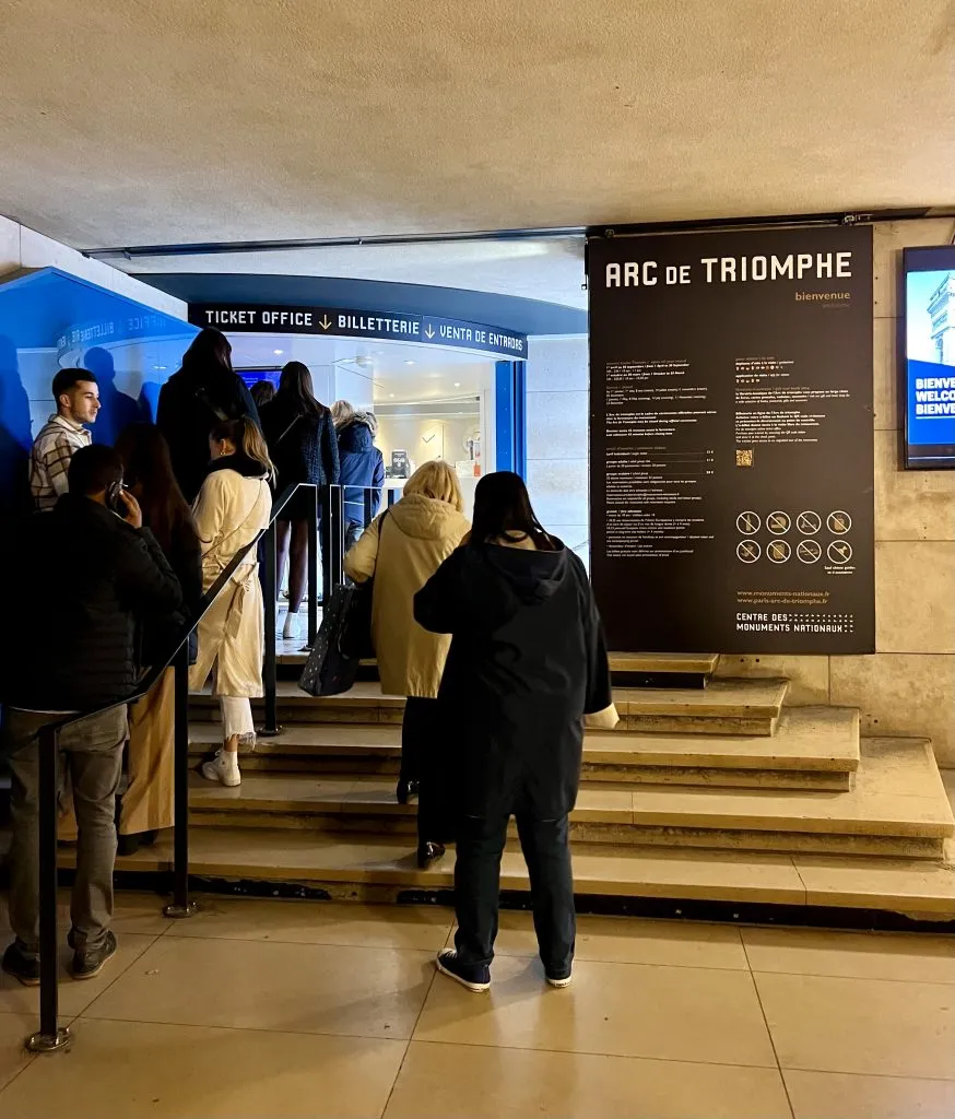 ticket line for visiting the arc de triomphe located underground