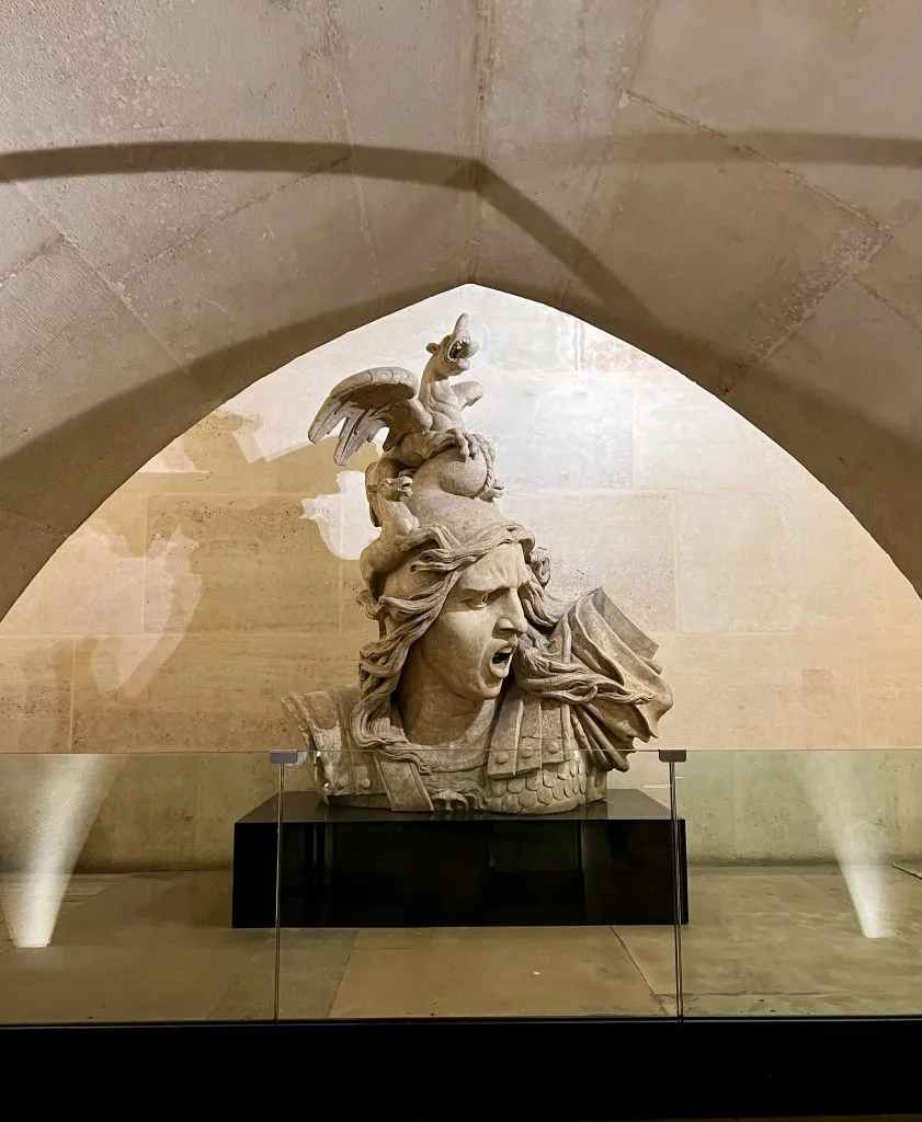 statue as seen inside the arc de triomphe in paris france