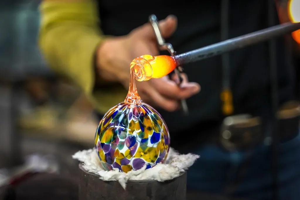close up of murano glass blowing demonstration in murano, one of the best venice islands venetian lagoon