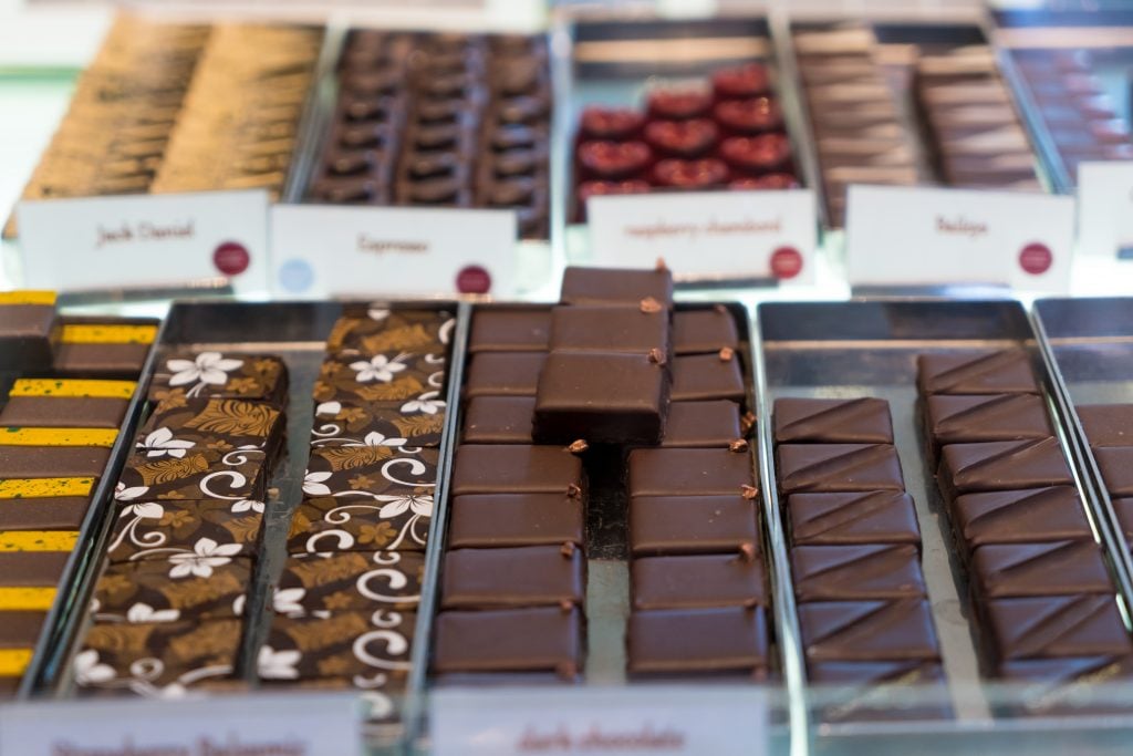 chocolates for sale at a chocolatier, one of the best things to put on a list of what to buy in paris france