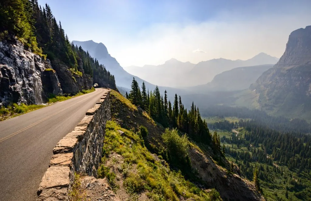 going to the sun road in glacier national park, one of the best places to visit in summer in usa