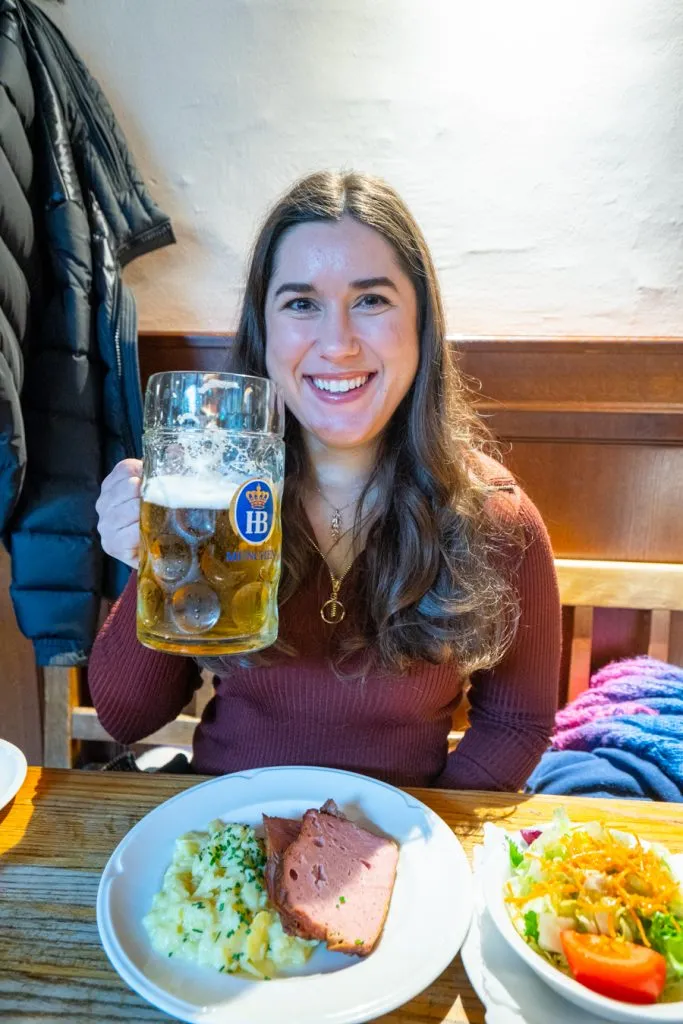 kate storm holding up a beer at hofbrauhaus in munich