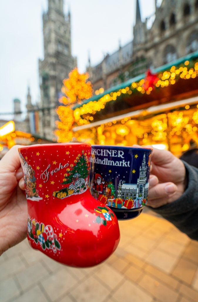red and blue christmas market mugs in munich germany that we paid a pfand to rent, a fun christmas tradition in bavaria germany