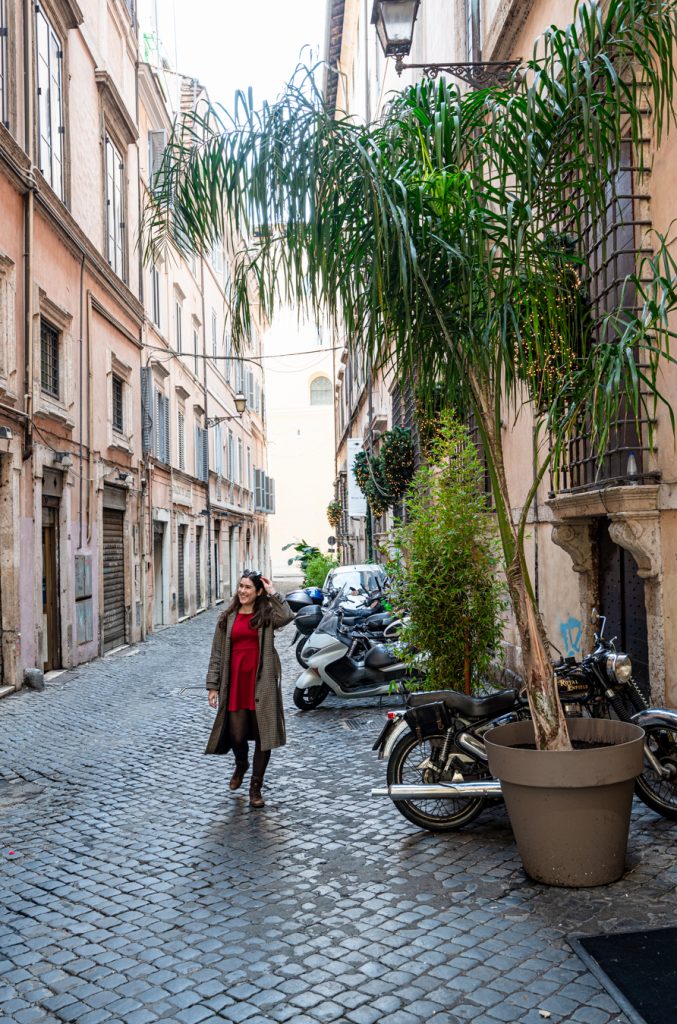 kate storm in a red dress wandering centro storico in rome italy