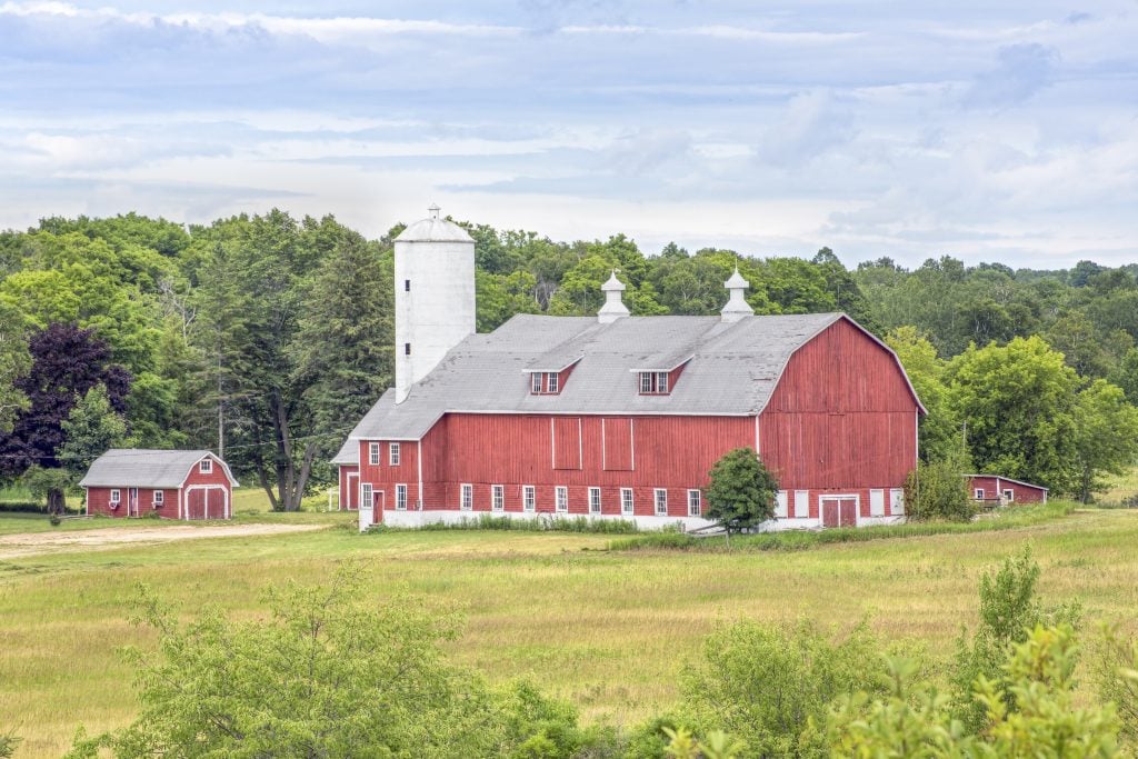 red barn in door county wisconsin, a fun place to visit in july usa