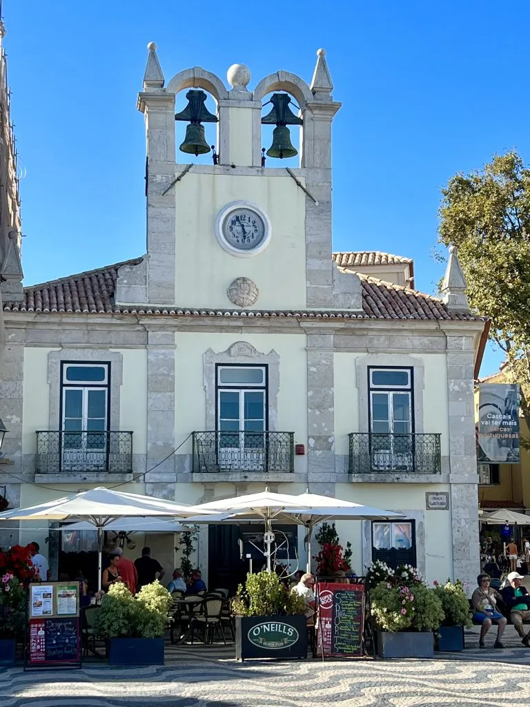 downtown center of cascais with a clock tower