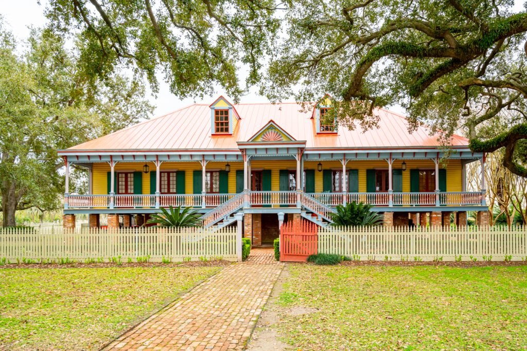 front facade of the laura plantation main house, one of the most interesting day trips from new orleans