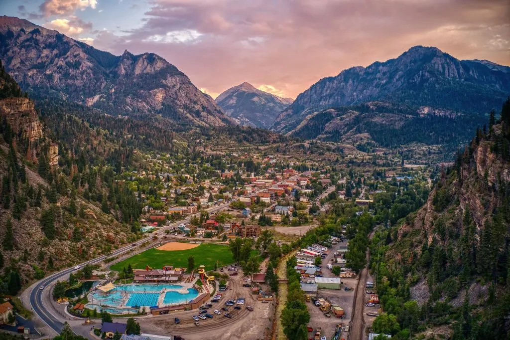 ouray colorado from above at sunset with mountains in the background