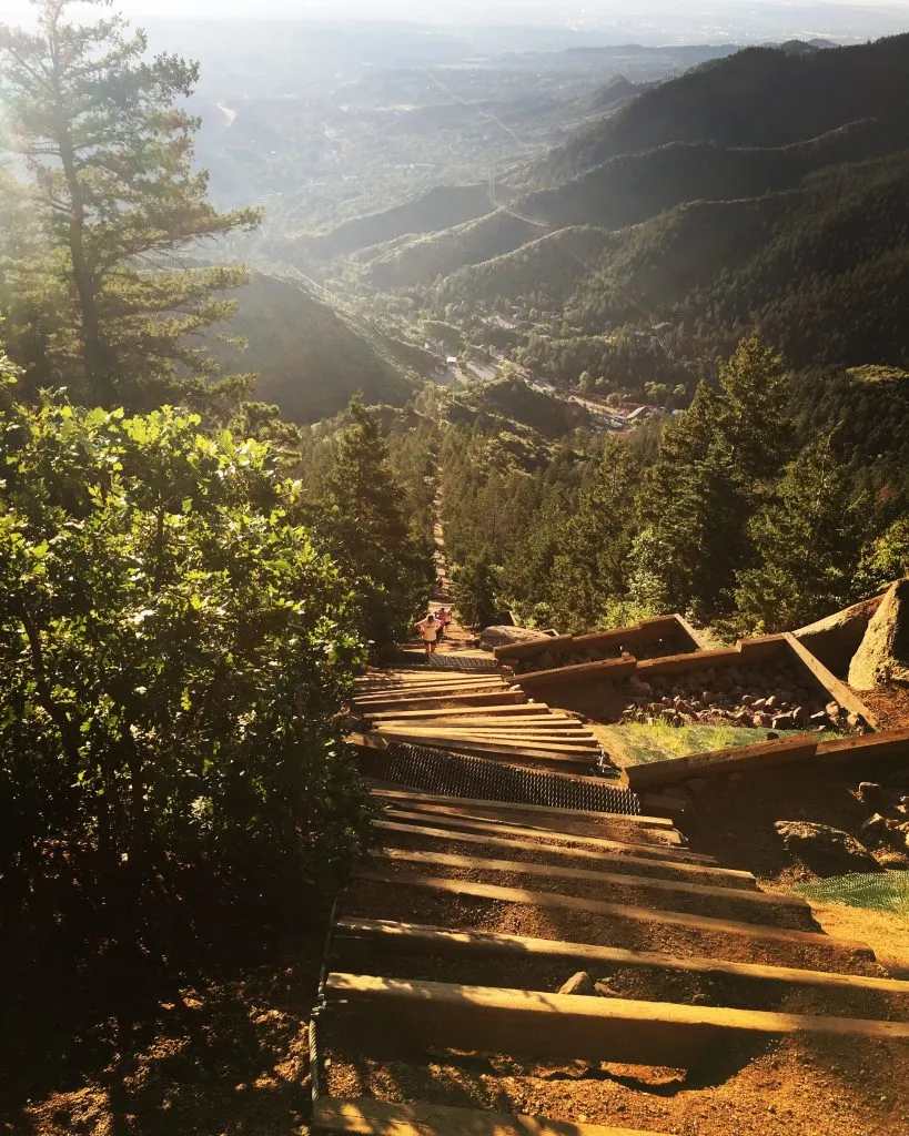 manitou incline hike as seen from the top with path leading back down prominent, manitou springs is one of the best mountain towns colorado