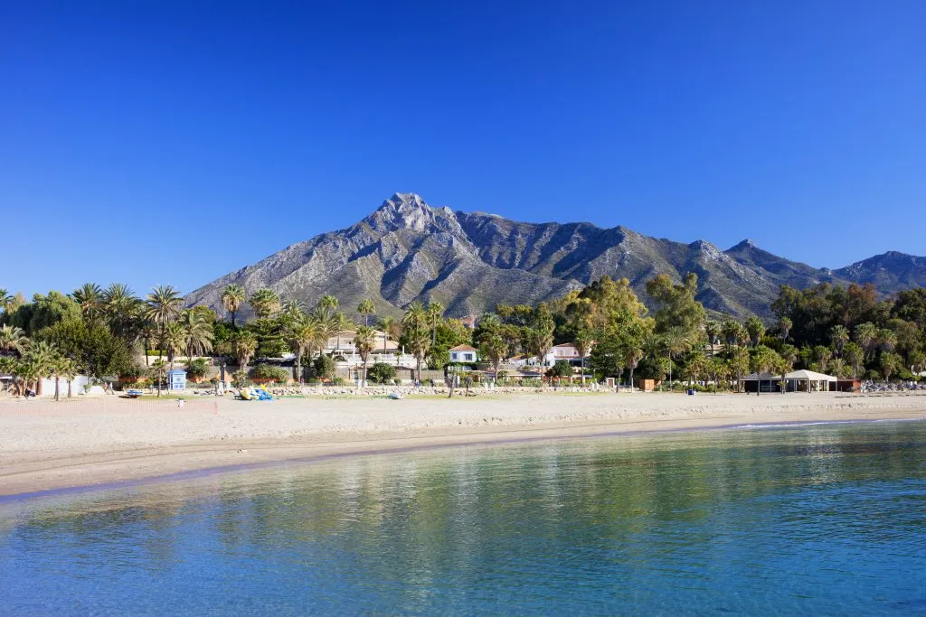 beach in marbella spain as seen from the calm water