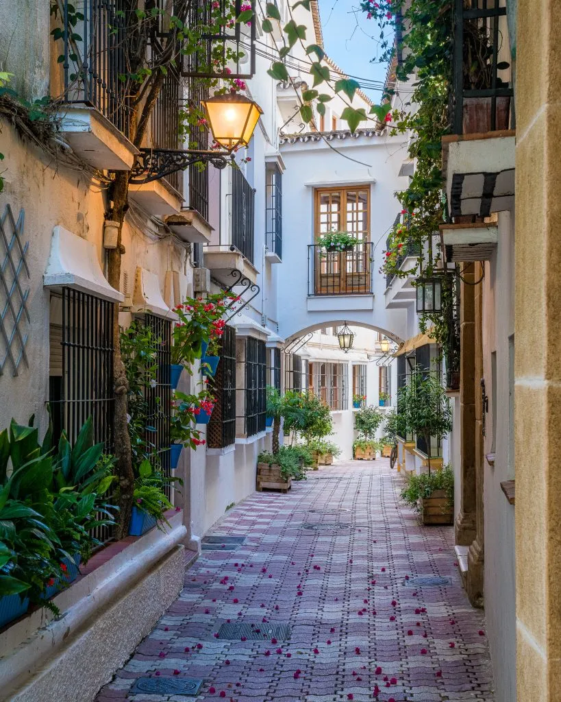 narrow street in marbella spain, one of the best european cities with beaches