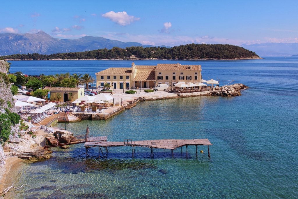 Faliraki peninsula beach in corfu town, one of the best cities in europe with beaches