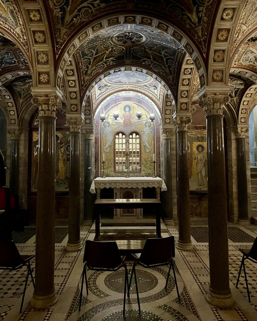 altar inside the crypt underground basilica of st cecilia, one of the best places to visit trastevere italy