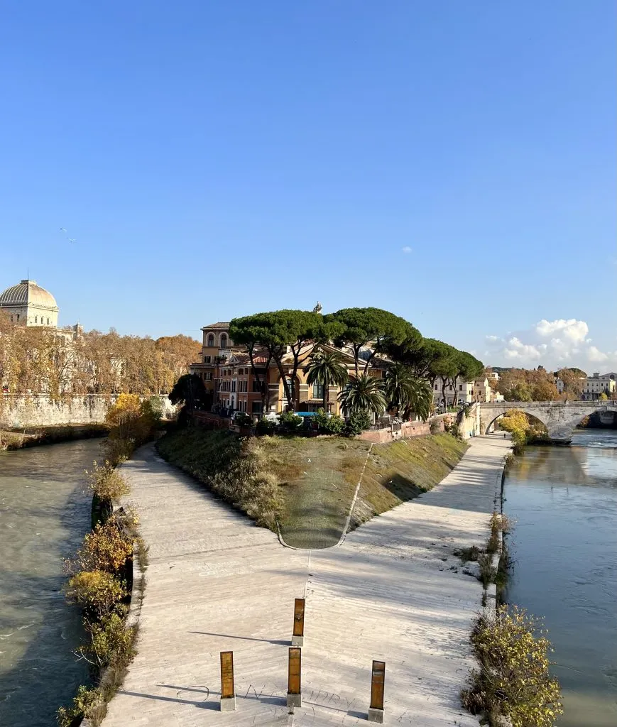 tiber island rome as seen from ponte garibaldi on a sunny day