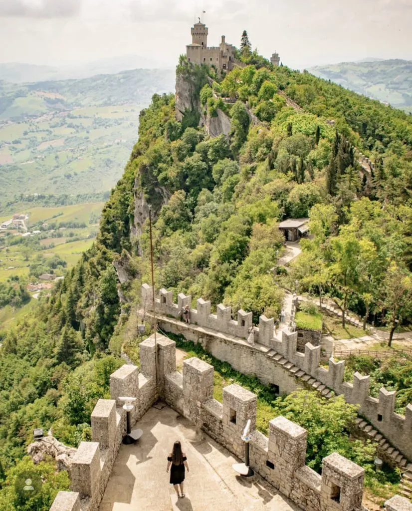 kate storm overlooking a tower in san marino as part of a 7 days in emilia romagna itinerary
