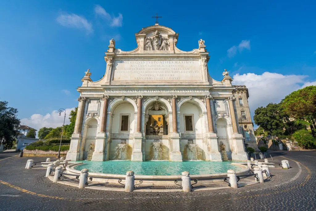 paola fountain on a sunny day as seen from the front, one of the best places to visit in trastevere neighborhood rome