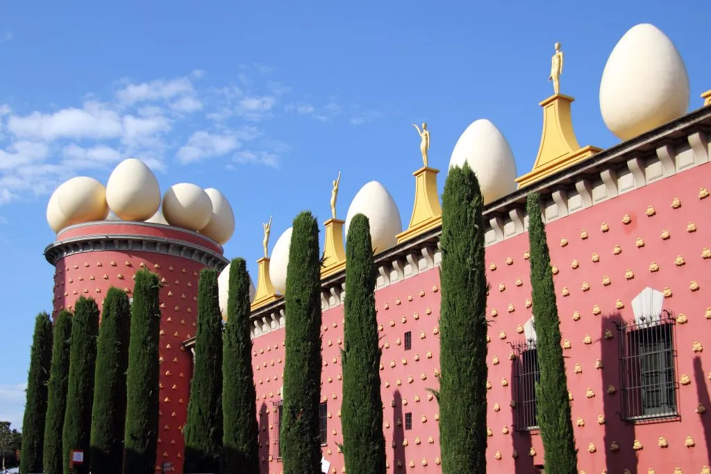 pink facade of the salvador dali museum in figueres spain