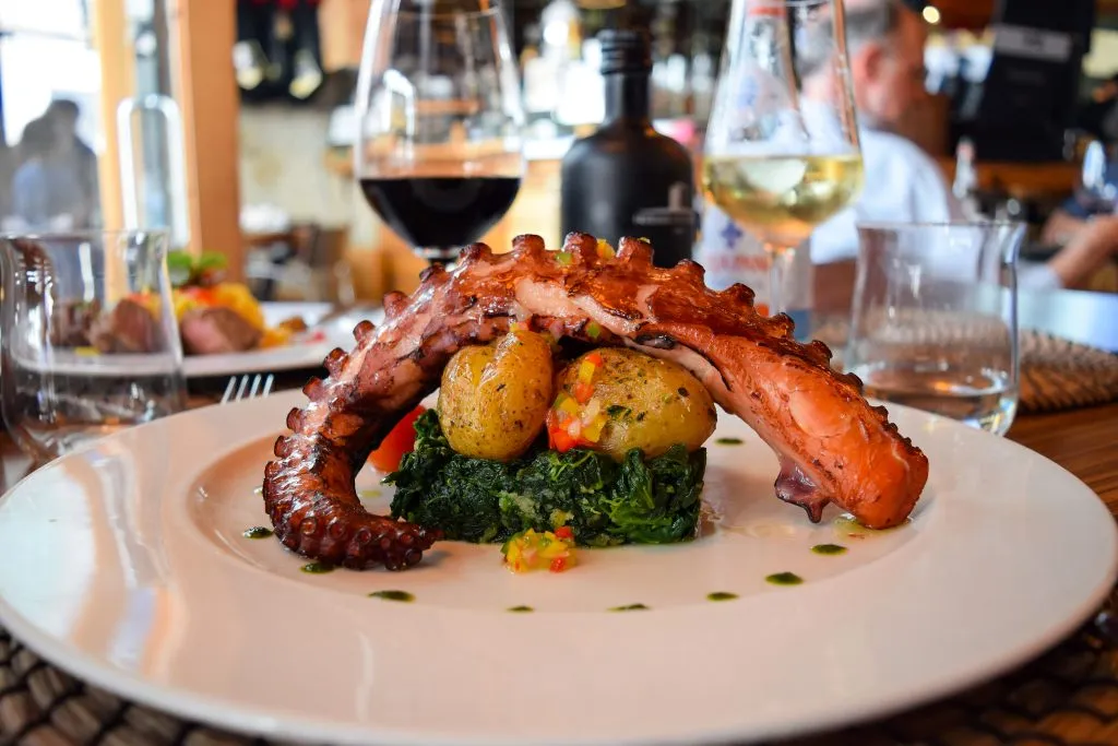 traditional grilled octopus dish with wine in lisbon portugal