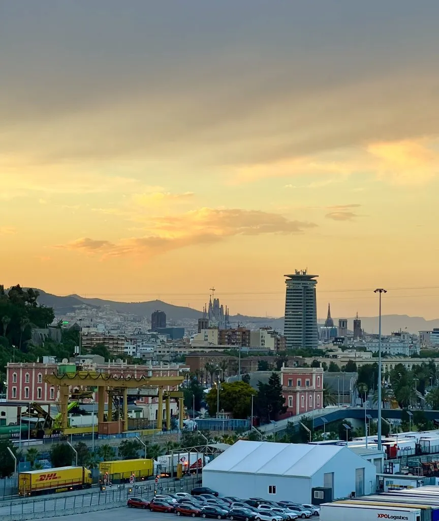 sunset view of barcelona spain from grimaldi lines boat