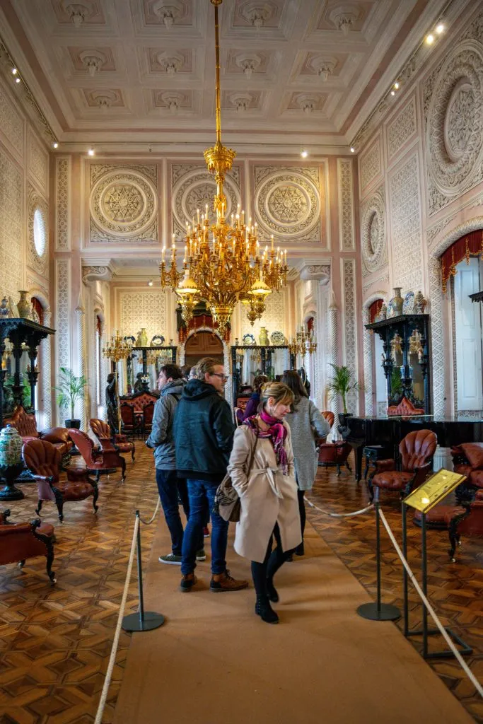 people touring the inside of pena palace on a day trip to sintra portugal