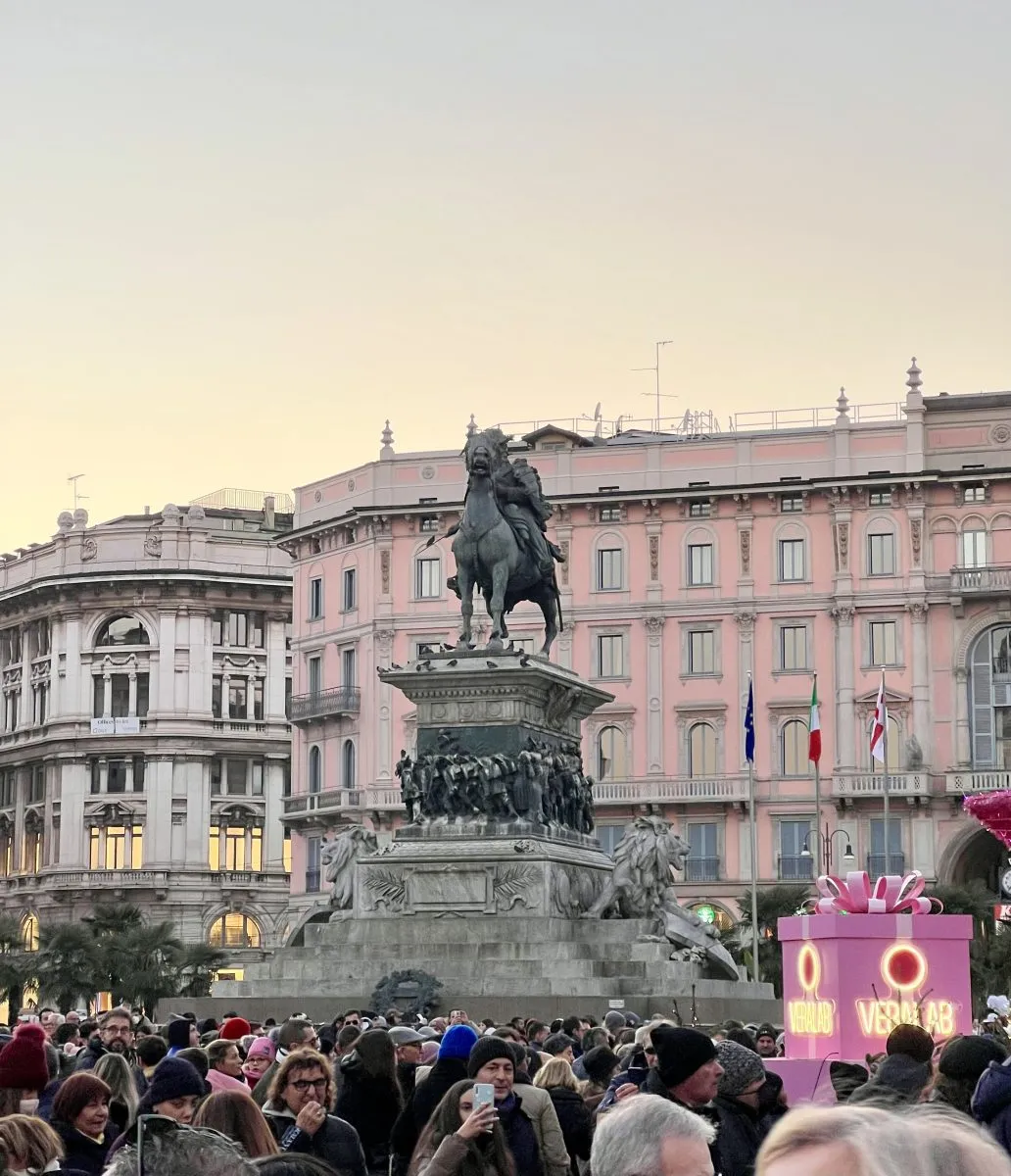 vittorio emanuele ii statue in milan main square at sunset