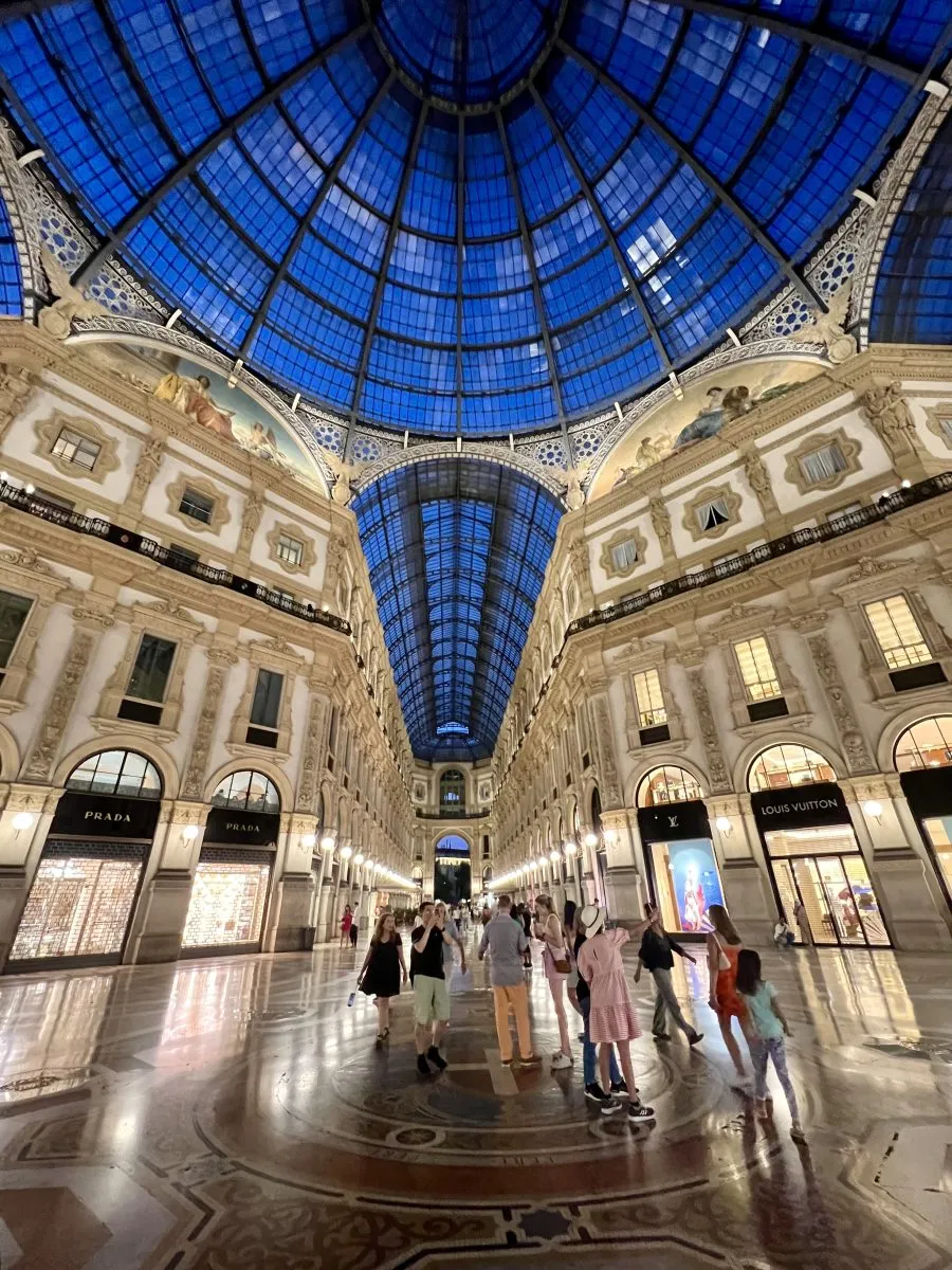 interior of galleria vittorio emanuele ii at night as seen when visiting milan duomo piazza