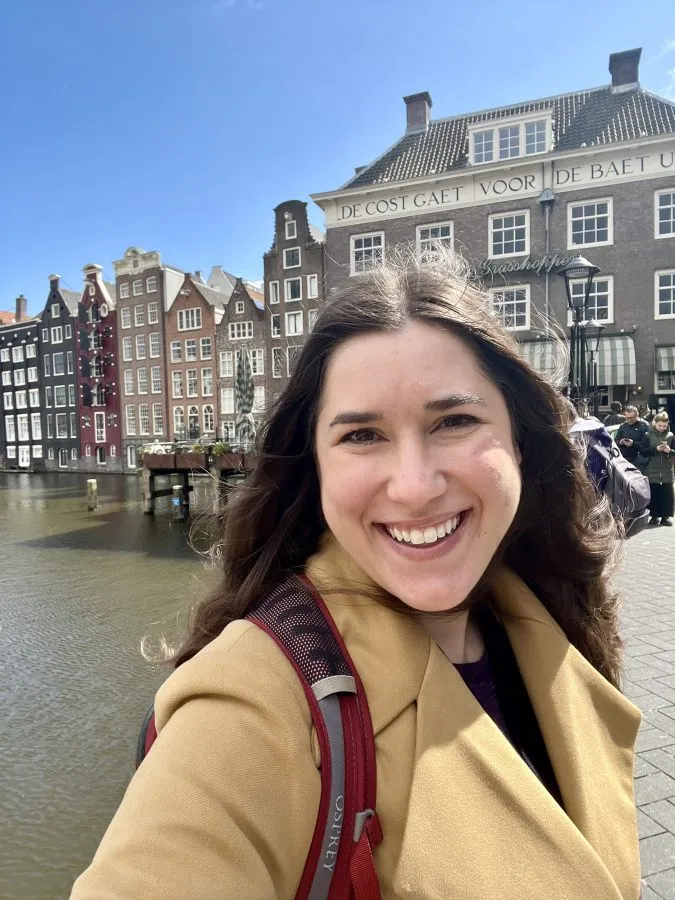 kate storm selfie in front of amsterdam canal during an april amsterdam vacation