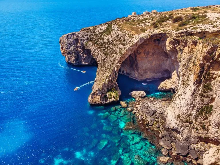 view of the blue grotto malta from above on a sunny and clear day