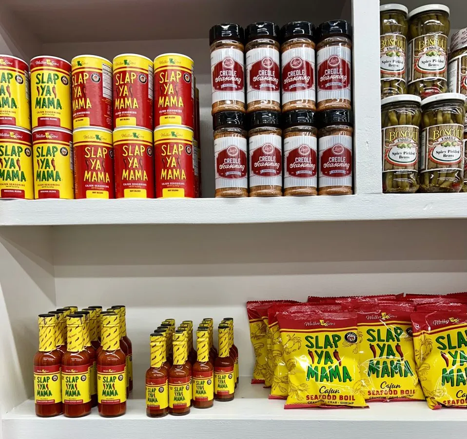 selection of cajun seasoning on display in a new orleans gift shop