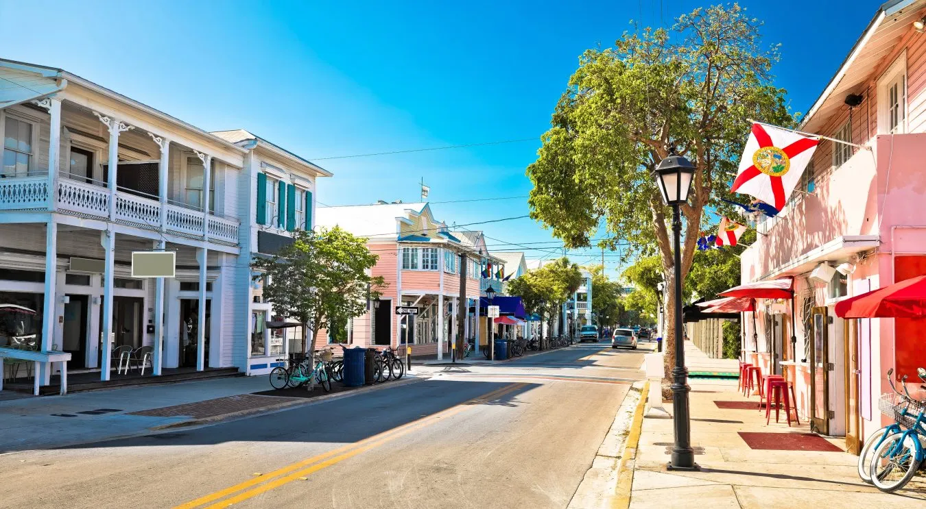duval street in key west florida lined with colorful buildings
