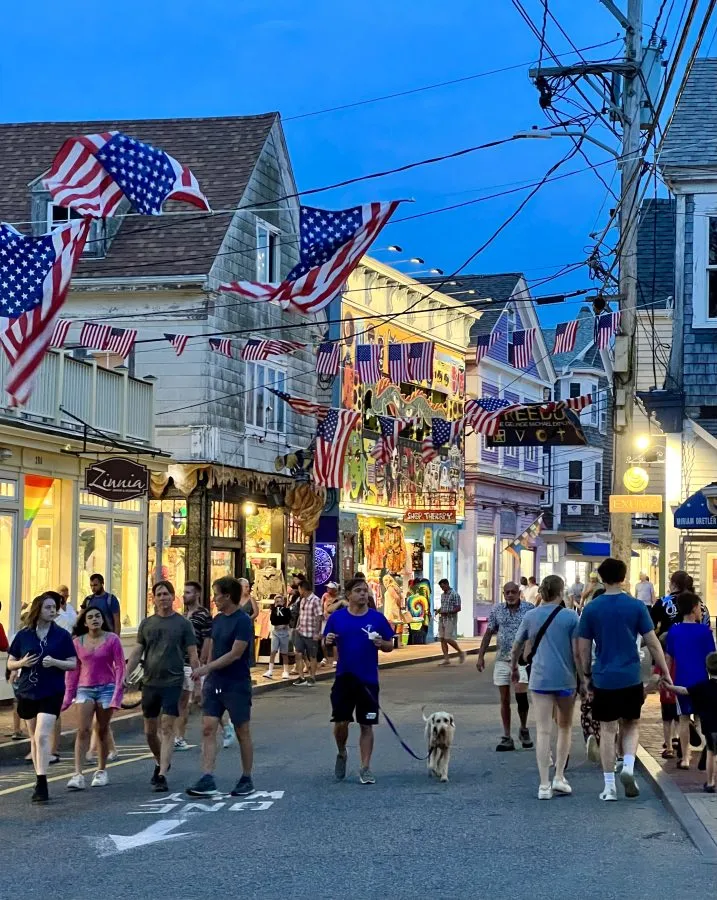 commercial street in provincetown ma during blue hour on a summer night